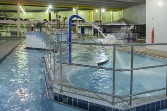 Interior. View looking south along the swimming pool hall, with the pool extension beyond.
