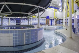 Interior. View looking west within the extension of the swimming pool hall.