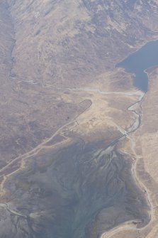 Oblique aerial view with the fish trap in Loch Slapin in the foreground, looking WNW.