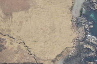 Oblique aerial view of Ramasaig, looking SW.