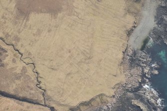 Oblique aerial view of Ramasaig, looking SW.