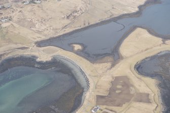 Oblique aerial view of the fish traps at Roag, looking NNW.