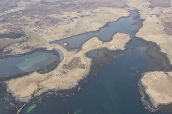 Oblique aerial view of the fish traps at Roag, Vatten, looking NW.