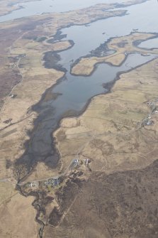Oblique aerial view of the fish traps at Heribost, Roskhill, looking SSE.