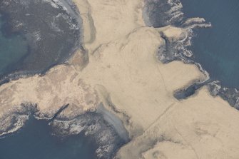 Oblique aerial view of Oronsay, looking E.