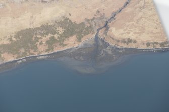 Oblique aerial view of the fish trap at Loch Harport, looking NE.