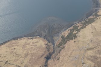 Oblique aerial view of the fish trap at Loch Harport, looking SW.