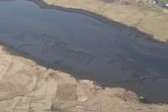 Oblique aerial view of the fish trap and kelp grids at River Snizort, looking ENE.