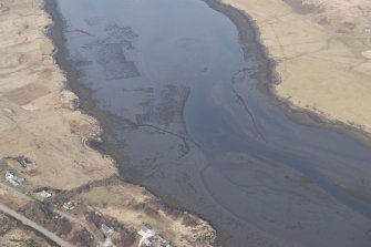 Oblique aerial view of the fish traps and kelp grids at River Snizort, looking NE.