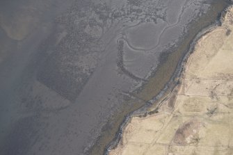 Oblique aerial view of the fish traps and kelp grids at River Snizort, looking SSE.