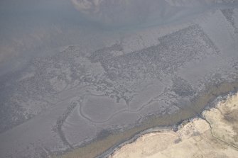 Oblique aerial view of the fish traps and kelp grids at River Snizort, looking SE.