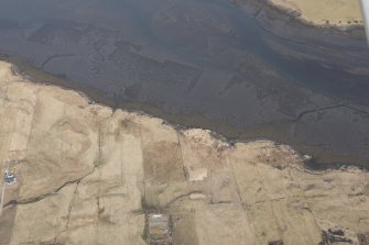 Oblique aerial view of the fish traps and kelp grids at River Snizort, looking NE.