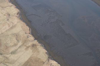 Oblique aerial view of the fish traps and kelp grids at River Snizort, looking NE.