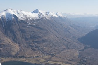 General oblique aerial view of Liathach with Torridon village in the foreground, looking NNE.