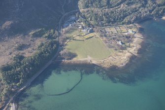 Oblique aerial view of the fish trap and Loch Torridon Hotel, looking SSW.