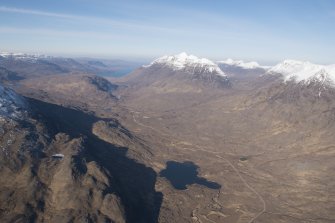 General oblique aerial view of Liathach, the Coire Dubh Mor and Beinn Eighe with the River Torridon and Loch Bharranch in the foreground, looking WNW.