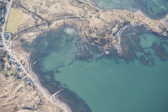 Oblique aerial view of the fish trap, looking SE.