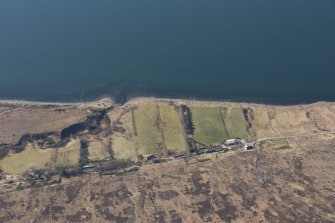 Oblique aerial view of Badrallach township centred ont he slipways, looking SSW.