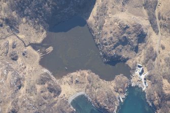 Oblique aerial view of the buildings, weir and nausts at Lochan Sal, looking S.