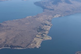 General oblique aerial view of Scoraig with Rireavach beyond, looking ESE.