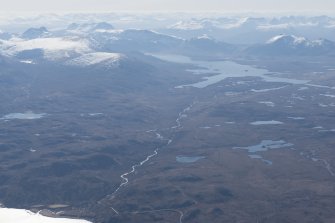 General oblique aerial view of the Little Gruinard River with Fionn Loch beyond, looking SSE.