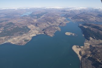 General oblique aerial view of Loch Alsh centred on Glas Eilean with Eilean Donan in the distance, looking ENE.