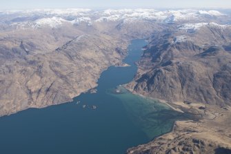 General oblique aerial view of Loch Hourn with the fish traps in Barrisdale Bay in the foreground, looking ENE.