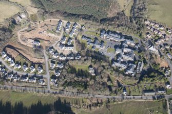 Oblique aerial view of Dingleton, Melrose, looking WNW.