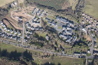 Oblique aerial view of Dingleton, Melrose, looking WNW.