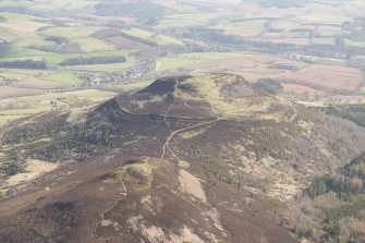 Oblique aerial view of the Eildon Hills, looking NE.