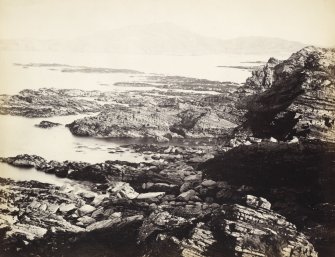 View of the rock formations at the 'entrance' to Kiloran Bay, Colonsay.
Titled: '142. Entrance to Kiloran Bay, Colonsay,'
PHOTOGRAPH ALBUM NO 186: J B MACKENZIE ALBUMS vol.1