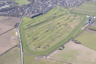Oblique aerial view of Kelso racecourse and golf course, looking SSW.