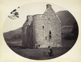 View of Kilmartin Castle ruined tower house with male figure and cow in foreground, Kilmartin, Argyll and Bute.
Titled: '170. Kilmartin Castle, Argyll.'
PHOTOGRAPH ALBUM NO 186: J B MACKENZIE ALBUMS vol.1