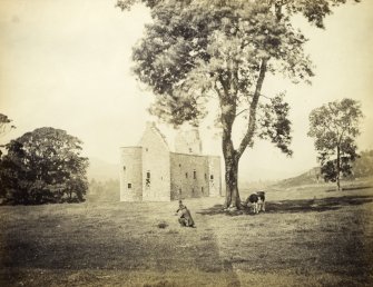 View of Kilmartin Castle ruined tower house with male figure and cow in foreground, Kilmartin, Argyll and Bute.
Titled: '181. Kilmartin Castle, Argyll.'
PHOTOGRAPH ALBUM NO 186: J B MACKENZIE ALBUMS vol.1