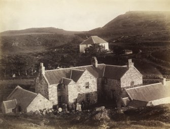 View of Colonsay Hotel in forground with group of figures, and Colonsay Parish Church in the Background at Scalasaig, Colonsay, Argyll.
Titled: '186. Hotel and Church, Colonsay, Argyllshire.'
PHOTOGRAPH ALBUM NO 186: J B MACKENZIE ALBUMS vol.1