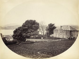 View of  Kilmichael Of Inverlussa Parish Church and adjoined Inverlussa House, formerly Parish Manse, in North Knapdale, Argyll. Vignetted photograph.
Titled: '89. North Knapdale Church & Manse.'
PHOTOGRAPH ALBUM NO 186: J B MACKENZIE ALBUMS vol.1