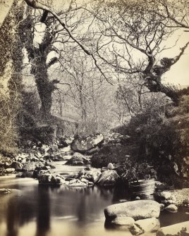 View of pool section on the river Lussa near Inverlussa House, formerly North Knapdale Manse, North Knapdale.
Titled: '91. Pool on the Lussa near North Knapdale Manse.'
PHOTOGRAPH ALBUM, NO 186: J B MACKENZIE ALBUMS vol.1