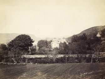 View of  Inverlussa House, formerly Parish Manse, and surrounding fields in North Knapdale, Argyll. 
Titled: '93. Manse of North Knapdale.'
PHOTOGRAPH ALBUM NO 186: J B MACKENZIE ALBUMS vol.1