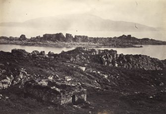 View, wide-angle, of ruins at Eileach An Naoimh, Argyll. The ruins of the ancient chapel are in the foreground.
Titled: '47. Ruins of Ancient Chapel On Ealan Naomh.'
PHOTOGRAPH ALBUM, NO 186: J B MACKENZIE ALBUMS vol.1