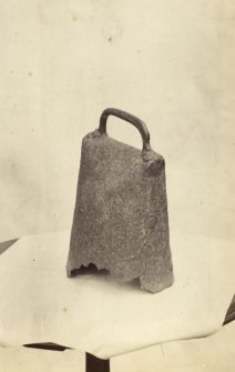 View of a 7th century Celtic hand bell descovered at Fortingall Manse, now situated on display in Fortingall Church.
Titled: '201. at Fortingall.'
PHOTOGRAPH ALBUM NO 186: J B MACKENZIE ALBUMS vol.1