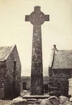 View of East Side of high cross slab, known as 'Great Cross', at Oronsay Priory Church ruins, Oronsay.
Titled: '54. Cross at Oronsay. East Side.'
PHOTOGRAPH ALBUM NO 186: J B MACKENZIE ALBUMS vol.1