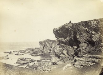 View of rock formation at Uragaig Beach, Colonsay.
Titled: '18. Rocks at Urgaig, Colonsay.'
PHOTOGRAPH ALBUM NO 186: J B MACKENZIE ALBUMS vol.1