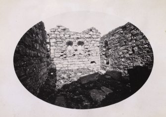 View of interior of ruins of Kilmory Chapel or St Maelrubha's Chapel, Kilmory, South Knapdale.
Titled: '107. Interior of chapel at Kilmory.'
PHOTOGRAPH ALBUM NO 186: J B MACKENZIE ALBUMS vol.1