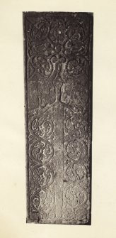View of late medieval carved stone grave slab at Kilmory Chapel, or St Maelrubha's Chapel, Kilmory, South Knapdale.
Titled: '119. At Kilmory. Mc Cormac's.'
PHOTOGRAPH ALBUM NO 186: J B MACKENZIE ALBUMS vol.1