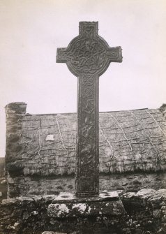 View of reverse of carved stone medieval 'memorial' cross, known as 'MacMillan's Cross', at Kilmory Chapel, or St Maelrubha's Chapel, Kilmory, South Knapdale.
Titled: '121. Mc Millan's Cross. Kilmory.'
PHOTOGRAPH ALBUM NO 186: J B MACKENZIE ALBUMS vol.1