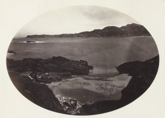 Elevated View of coastal beach with text enscribed into the sand, probably Kiloran Bay, Colonsay, Argyll. 
The text in the sand reads, 'J.B.M. 23rd April 1869.'
The image has been given the title '129'.
PHOTOGRAPH ALBUM No. 187, (cf PAs 186 and 188) Rev. J.B. MacKenzie of Colonsay Albums,1870, vol.2.
