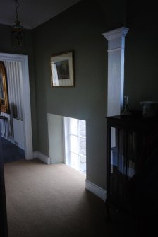 Interior view of staircase window from upper level