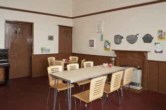 Interior. General view of front room, used as a cafe.