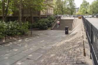 View of the steps and sloping paths leading to the underpass entrance of St George's Cross subway station