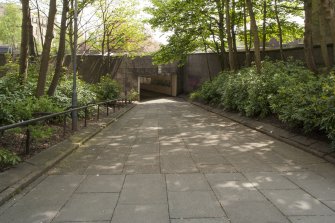 View from the north west looking down the sloping path to the underpass entrance of St George's Cross subway station